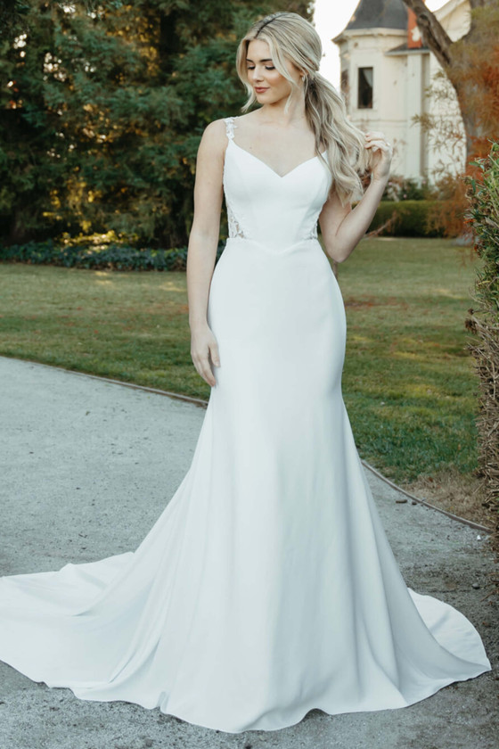 Chic crepe gown with a flattering sweetheart neckline and fitted silhouette