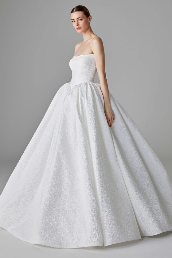 Strapless textured ball gown with full skirt and structured bodice for timeless elegance