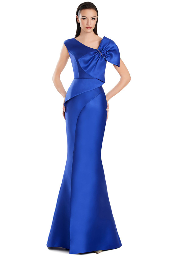Royal blue satin mermaid dress with striking asymmetrical bow shoulder detail.
