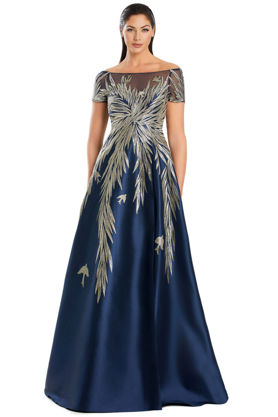 Navy illusion gown with gold palm embroidery and short sleeves on a full A-line skirt