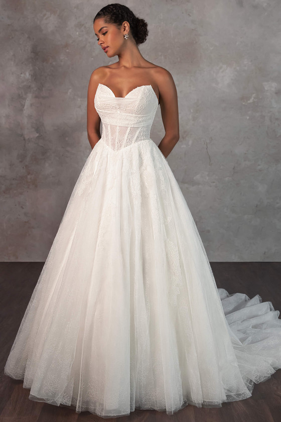 Romantic lace ballgown with a sculpted sweetheart neckline and sheer corset bodice Romantic lace ballgown with a sculpted sweetheart neckline and sheer corset bodice