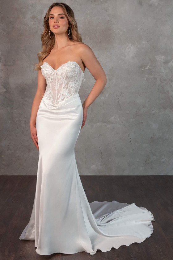 This strapless gown blends a floral lace corset bodice with a slinky satin skirt for modern allure This strapless gown blends a floral lace corset bodice with a slinky satin skirt for modern allure