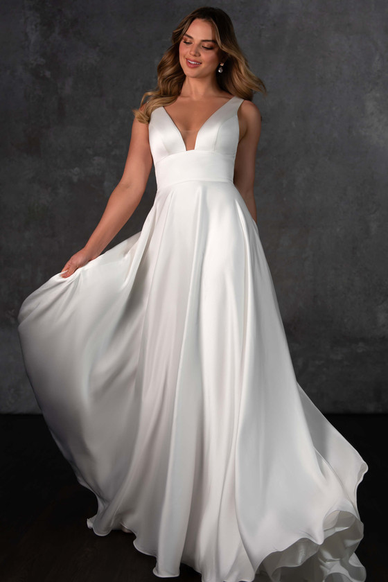 Effortlessly elegant, this flowing satin gown features a plunging neckline and soft, sweeping movement Effortlessly elegant, this flowing satin gown features a plunging neckline and soft, sweeping movement