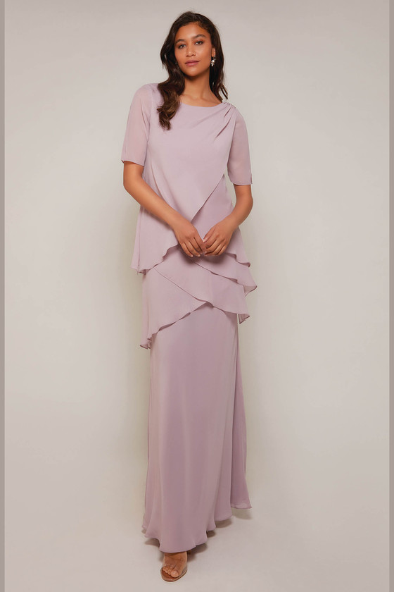 Alternate angle in Orchid showcasing elbow-length sleeves and flowing A-line shape