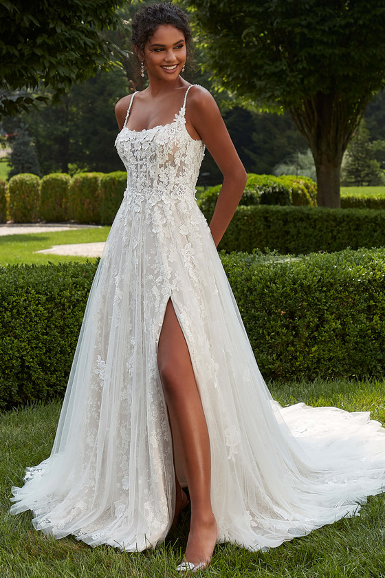 Front view of Morilee Palmina A-line gown with thigh-high slit and lace appliqués.