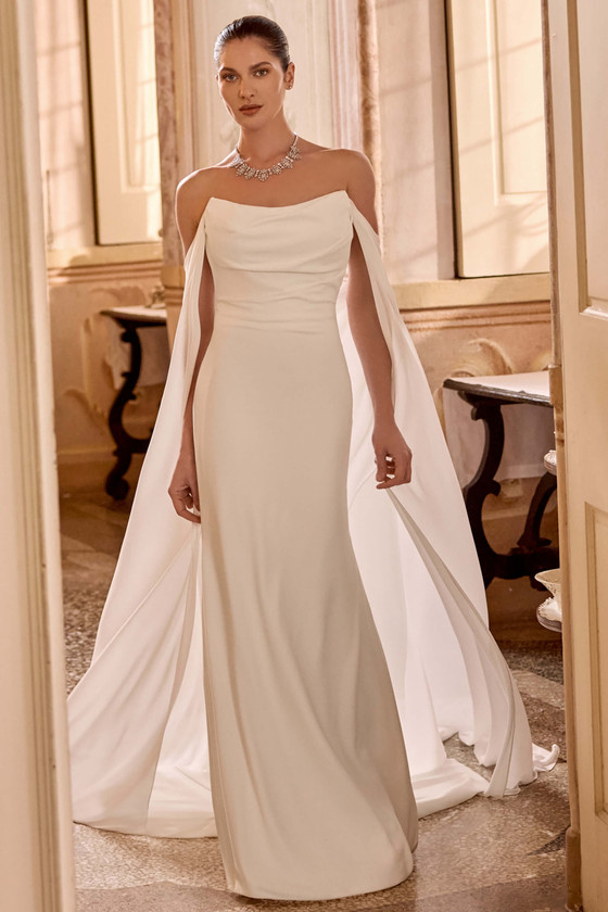 Justin Alexander Leti fit and flare wedding gown with scoop neckline, ruched bodice, and ivory crepe skirt.