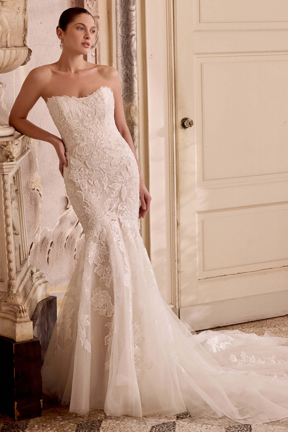 Justin Alexander Lorenna fit and flare wedding gown with scoop neckline, sparkling lace, and exposed boning.