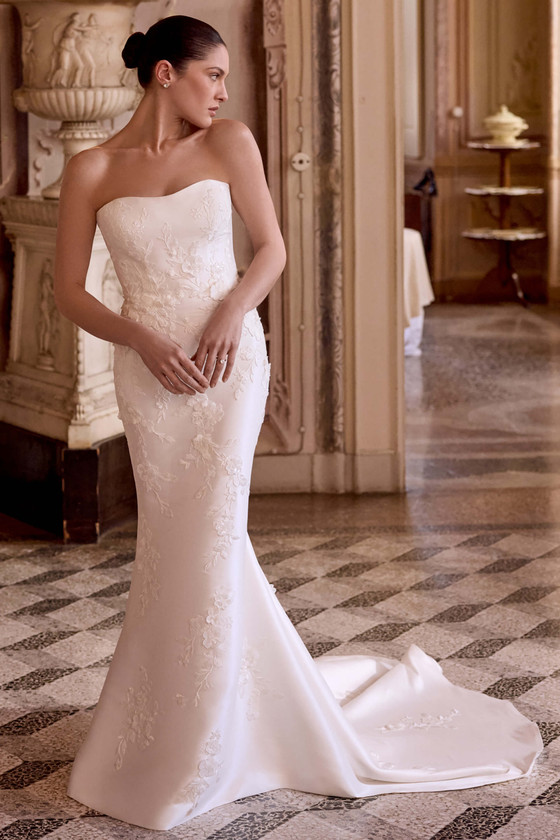 Justin Alexander Leigh fit and flare wedding gown with sweetheart neckline, mikado fabric, and matte lace appliqués.