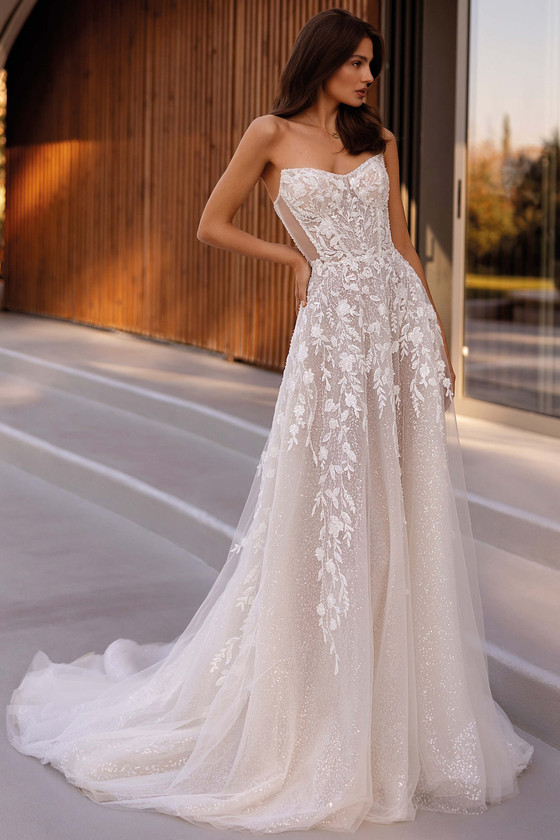 Demetrios Style 1501 A-line wedding dress with strapless sweetheart neckline, shimmering tulle, and beaded lace.