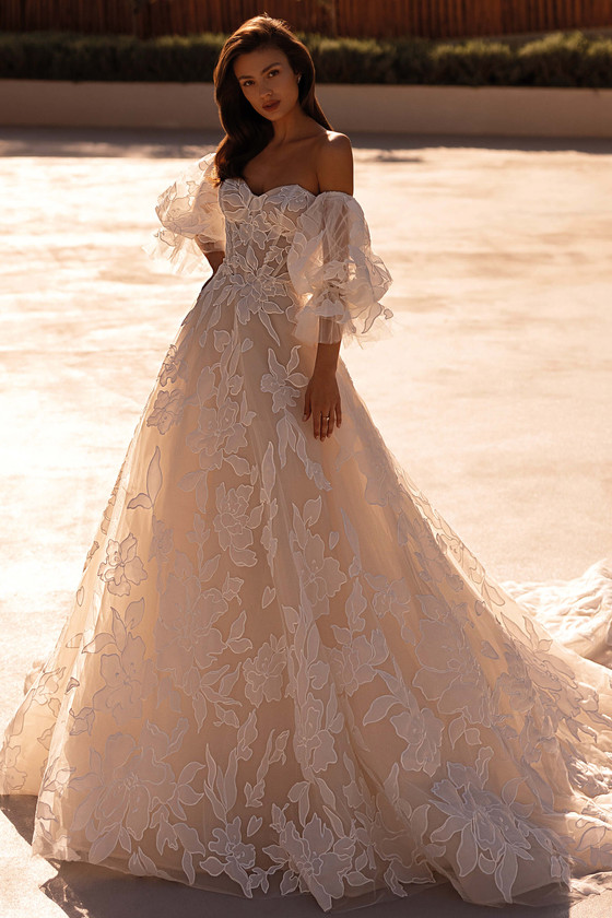 Demetrios Style 1524 ball gown wedding dress with embroidered tulle, oversized floral appliqués, and romantic volume.