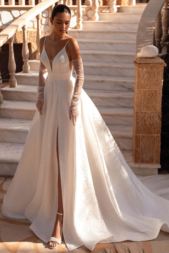 Demetrios 8246 brocade A-line wedding gown with spaghetti straps and thigh-high slit, front view