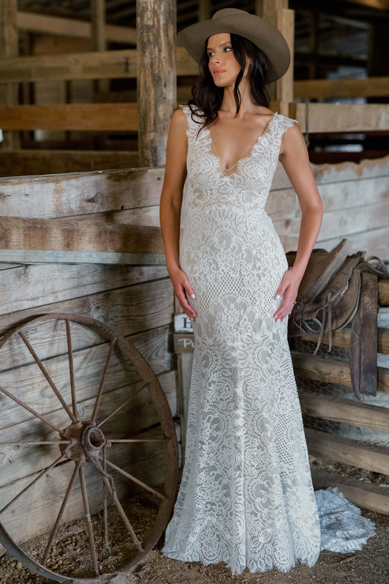 Watters Pilar sheath wedding gown with plunging V-neckline and lace overlay front view