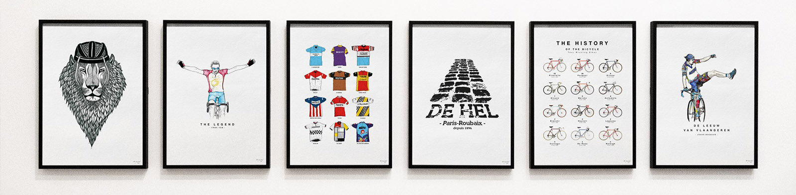 Set of framed cycling-themed art prints displayed on a white wall
