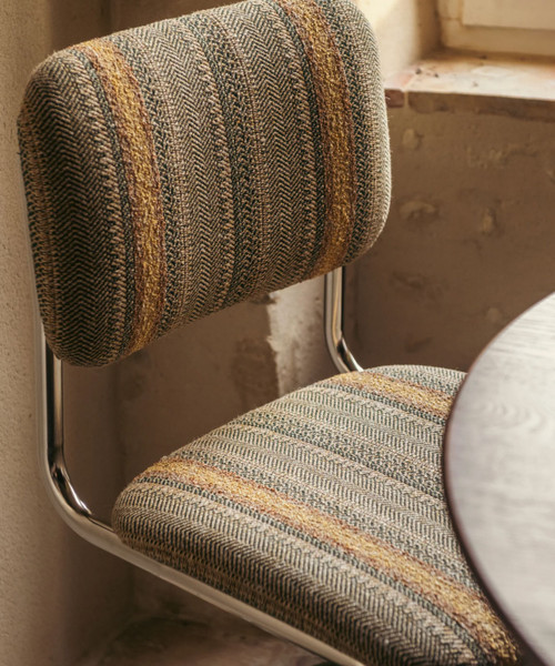 Beige and green with ochre stripes woven fabric and steel chair