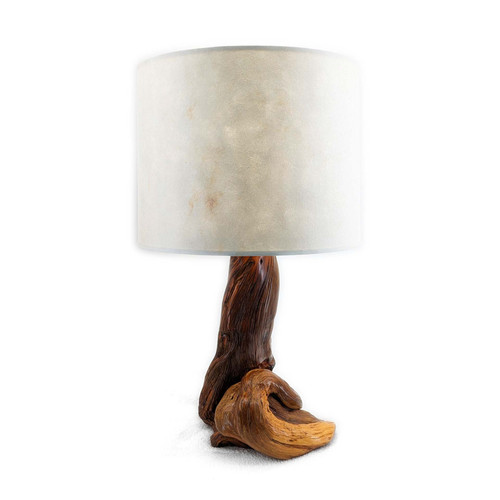 Polished juniper lamp featuring a prominent twist at the base with white handmade paper shade