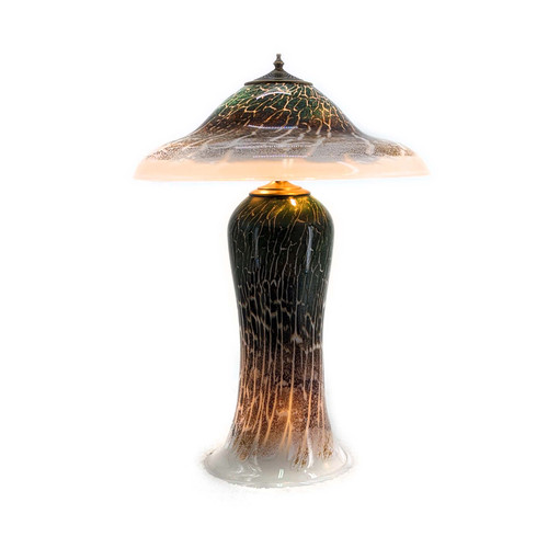 Handblown glass table lamp with base and lampshade that each transition from deep green, to brown, then white in an elegant bark-like pattern. Handblown glass table lamp with base and lampshade that each transition from deep green, to brown, then white in an elegant bark-like pattern.