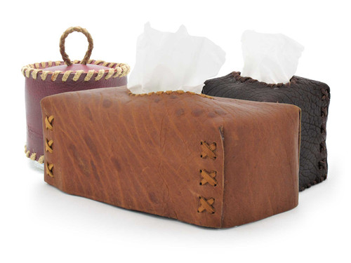 Assorted buffalo leather tissue box covers showing a variety of shapes and colors.