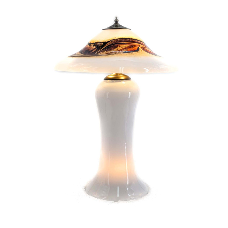 Buffalo Collection Brown & White Handblown Glass Table Lamp Image Handblown glass table lamp with an all-white base and white lampshade with blown brown accents which swirl around the lampshade