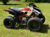 Kayo Storm 150 EFI ATV, a rugged and stylish all-terrain vehicle designed for off-road adventures. The ATV features a sleek black and red color scheme, with aggressive front tires, a double A-arm suspension system, and a sturdy frame. The image highlights the ATV's compact design, hydraulic disc brakes, and comfortable seat, making it an ideal choice for riders seeking performance and reliability on challenging terrains. Kayo Storm 150 EFI ATV, a rugged and stylish all-terrain vehicle designed for off-road adventures. The ATV features a sleek black and red color scheme, with aggressive front tires, a double A-arm suspension system, and a sturdy frame. The image highlights the ATV's compact design, hydraulic disc brakes, and comfortable seat, making it an ideal choice for riders seeking performance and reliability on challenging terrains.