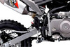 Wrap Around Frame 
Traditional mini bikes produced by our competitors have a CRF50 style frame. We went back to the drawing board and applied our knowledge from larger, heavier duty bikes. The new TSK90 frame is what we call a wrap-around frame where the swing arm sits between it and the engine, which reduces stress on the bearings and gives the overall system better strength.