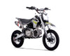Thumpstar TSC 125 pit bike, highlighting its signature stealth plastics, wrap-around frame, and gripper striped seat. The bike is displayed in an action-ready stance, emphasizing its conventional front forks, rear mono shock, and front and rear disc brakes. The forged triple clamps and stator guard are subtly visible, underscoring the bike’s durability and safety features. The Mikuni VM22 carburetor and standard exhaust system are also highlighted, showcasing the bike’s performance enhancements.