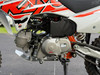 The Kayo TD110 EFI Pit Bike features a sleek, aggressive design with a black and red color scheme, inverted front forks, knobby off-road tires, and a high-mounted exhaust. The EFI fuel system, hydraulic disc brakes, and reinforced steel frame make this mini dirt bike a top choice for performance-oriented riders