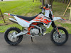 The Kayo TD110 EFI Pit Bike features a sleek, aggressive design with a black and red color scheme, inverted front forks, knobby off-road tires, and a high-mounted exhaust. The EFI fuel system, hydraulic disc brakes, and reinforced steel frame make this mini dirt bike a top choice for performance-oriented riders