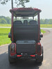 Evolution D-MAX GT4 luxury electric golf cart with forward-facing design, black automotive-grade seats, 10.1-inch touchscreen with CarPlay, 24-speaker audio system, LED lighting, and aluminum wheels, built for performance and style.