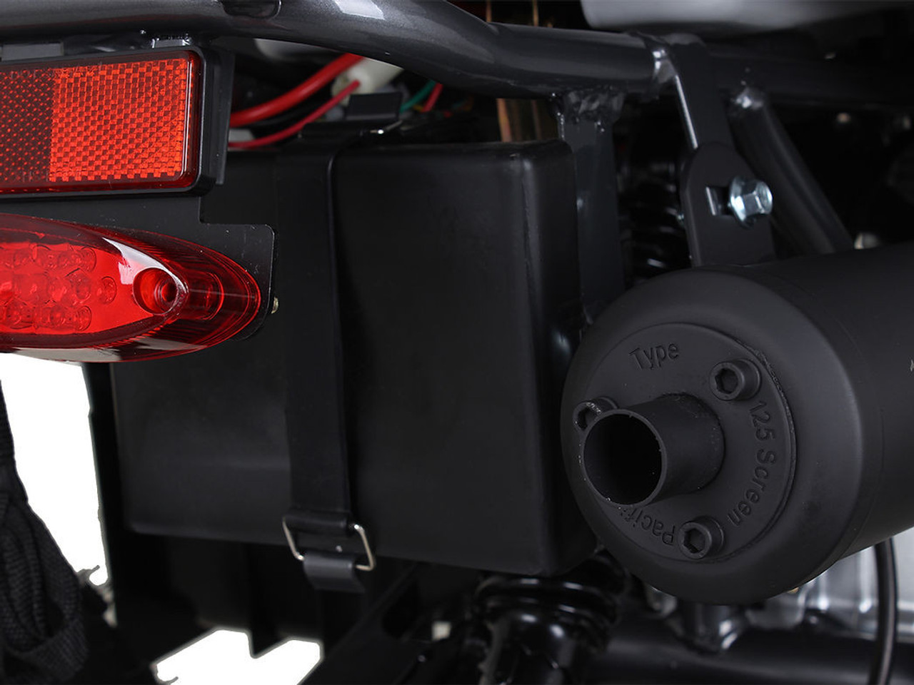 The image showcases the Syx Moto SY70, a sleek and rugged off-road motorcycle designed for young riders and adventure enthusiasts. The bike features a modern grey color scheme with upgraded plastics, a robust frame, and aggressive off-road tires. Key details include the 70cc engine, hydraulic disc brakes, and ergonomic design elements like the easy-reach brake levers and redesigned thumb throttle. The image highlights the bike's durability, performance, and user-friendly features, making it an ideal choice for off-road adventures. The image showcases the Syx Moto SY70, a sleek and rugged off-road motorcycle designed for young riders and adventure enthusiasts. The bike features a modern grey color scheme with upgraded plastics, a robust frame, and aggressive off-road tires. Key details include the 70cc engine, hydraulic disc brakes, and ergonomic design elements like the easy-reach brake levers and redesigned thumb throttle. The image highlights the bike's durability, performance, and user-friendly features, making it an ideal choice for off-road adventures.