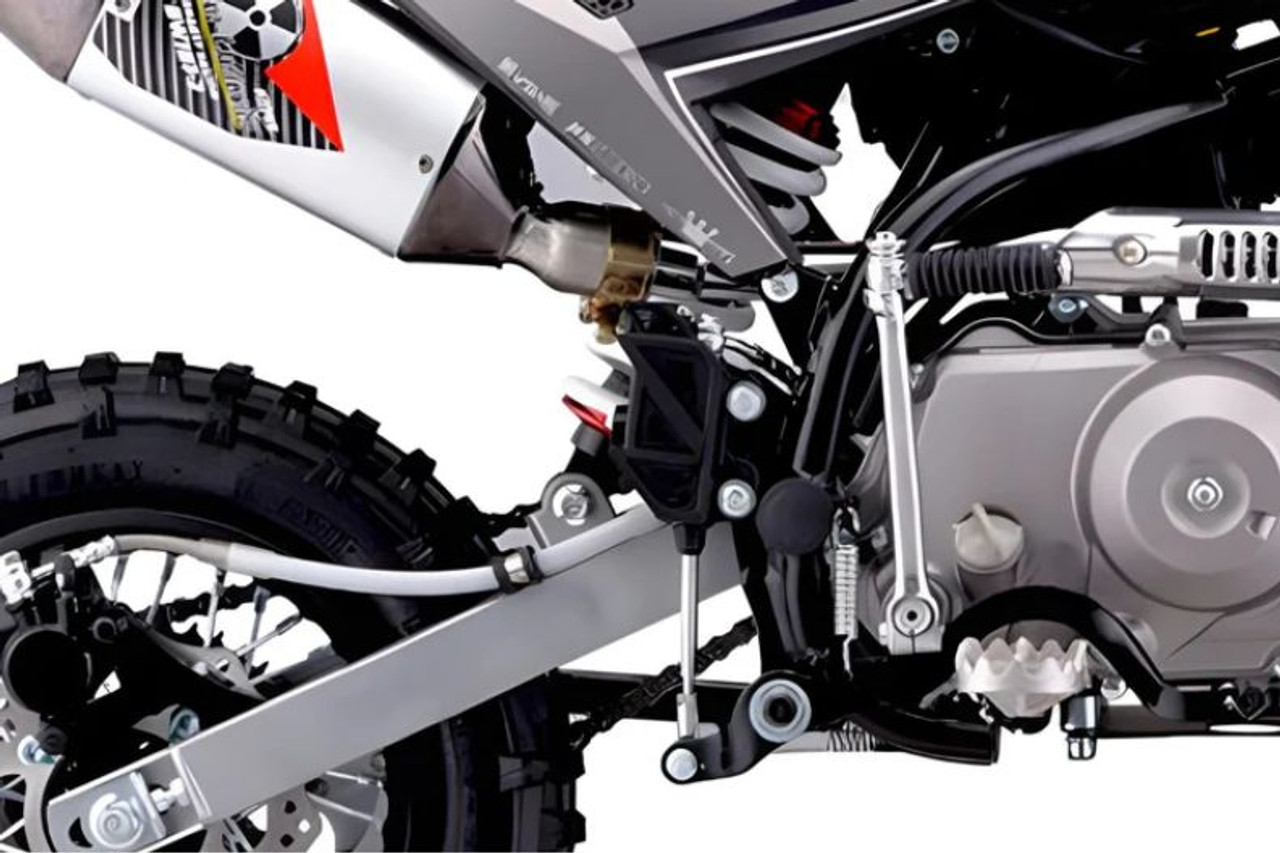 Wrap Around Frame 
Traditional mini bikes produced by our competitors have a CRF50 style frame. We went back to the drawing board and applied our knowledge from larger, heavier duty bikes. The new TSK90 frame is what we call a wrap-around frame where the swing arm sits between it and the engine, which reduces stress on the bearings and gives the overall system better strength.