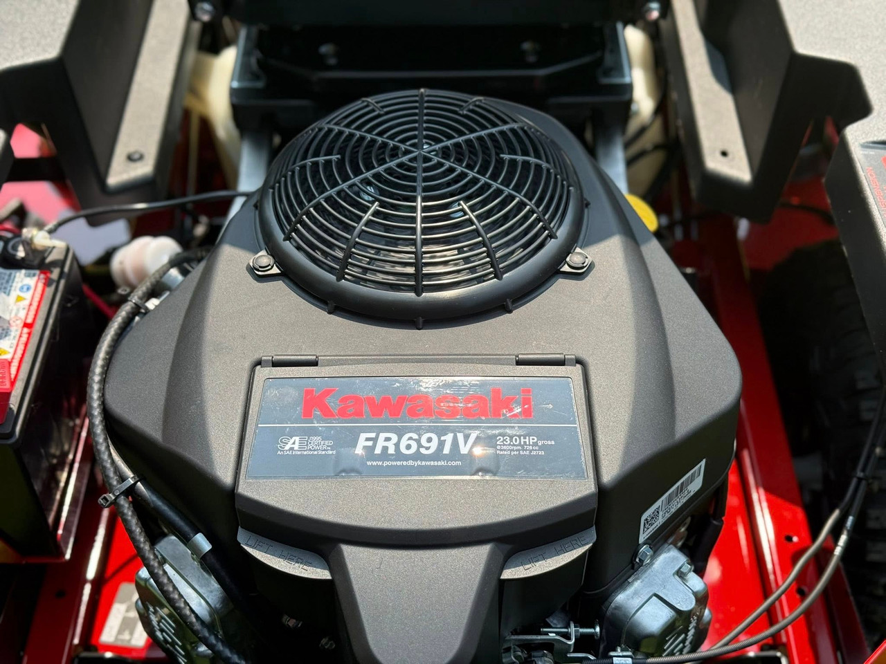 The image showcases the Toro TimeCutter MAX with MyRIDE® Suspension, a zero-turn mower designed for residential lawn care. The mower features a 54-inch IronForged® steel deck, a gaming-style seat, and hybrid-tread rear tires for maximum traction. The MyRIDE® Suspension System is prominently highlighted, emphasizing its ability to provide a smooth, comfortable ride over rough terrain. The image also highlights the spray-blocking fenders, automotive-style fuel fill, and integrated drain hose, showcasing the mower's user-friendly and maintenance-friendly features. The image showcases the Toro TimeCutter MAX with MyRIDE® Suspension, a zero-turn mower designed for residential lawn care. The mower features a 54-inch IronForged® steel deck, a gaming-style seat, and hybrid-tread rear tires for maximum traction. The MyRIDE® Suspension System is prominently highlighted, emphasizing its ability to provide a smooth, comfortable ride over rough terrain. The image also highlights the spray-blocking fenders, automotive-style fuel fill, and integrated drain hose, showcasing the mower's user-friendly and maintenance-friendly features.