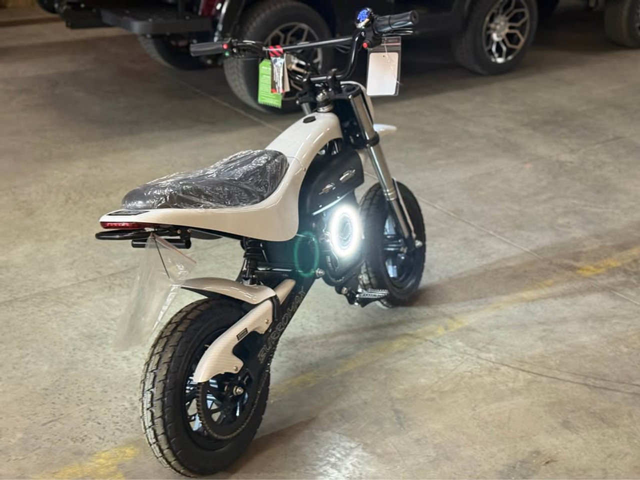"The Burromax TT1600R electric super bike features a 1600W brushless motor, 52V lithium battery, and 32 mph top speed. With hydraulic disc brakes, premium suspension, LED lighting, and 350 lb capacity, this full-size electric motorcycle delivers professional performance. Includes 4 ride modes, USB ports, and 30-mile range."