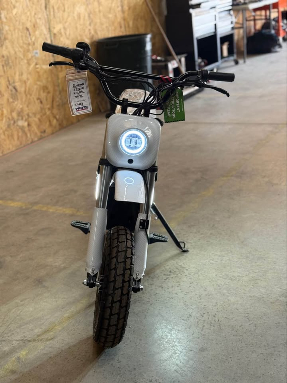 "The Burromax TT1600R electric super bike features a 1600W brushless motor, 52V lithium battery, and 32 mph top speed. With hydraulic disc brakes, premium suspension, LED lighting, and 350 lb capacity, this full-size electric motorcycle delivers professional performance. Includes 4 ride modes, USB ports, and 30-mile range."