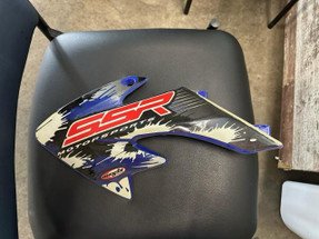 LEFT FUEL TANK SHROUD (BLUE) (17 & OLDER) Fits SSR SR70c, SR70Auto, SR110, SR125 LEFT FUEL TANK SHROUD (BLUE) (17 & OLDER) Fits SSR SR70c, SR70Auto, SR110, SR125