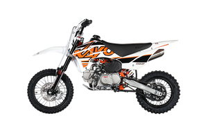 2025 Kayo TD 125TD 125, a sleek and modern dirt bike designed for off-road enthusiasts. The bike features a bold design with a black and red color scheme, highlighting its aggressive yet stylish appearance. The inverted front forks and single rear shock suspension are prominently visible, emphasizing the bike's superior handling and stability. The knobby tires (60/100-14 front and 80/100-12 rear) are shown gripping the terrain, showcasing their traction and durability. The 123.7 cc SOHC 4-stroke engine is centrally located, with the air-cooled system visible for efficient heat dissipation. The front and rear disc brakes are clearly displayed, highlighting the bike's safety features. The 29.5-inch seat height and 165 lbs lightweight frame make it accessible for riders of all skill levels. The image captures the bike in an off-road setting, ready to tackle dirt trails, rocky paths, and challenging terrains.