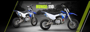 Thumpstar HUNGE 110-C 20th Anniversary Edition in its vibrant NEON color option, highlighting its retro-inspired swingarm and modern plastic bodywork. The bike is positioned on a dirt track, emphasizing its off-road capabilities. Key features such as the YX 110cc engine, VS1 adjustable forks, and 7075 alloy rims are clearly visible, along with the Pipe Bomb DW-2 exhaust system. The image captures the bike’s sleek design and rugged durability, making it an ideal choice for pit bike enthusiasts. Thumpstar HUNGE 110-C 20th Anniversary Edition in its vibrant NEON color option, highlighting its retro-inspired swingarm and modern plastic bodywork. The bike is positioned on a dirt track, emphasizing its off-road capabilities. Key features such as the YX 110cc engine, VS1 adjustable forks, and 7075 alloy rims are clearly visible, along with the Pipe Bomb DW-2 exhaust system. The image captures the bike’s sleek design and rugged durability, making it an ideal choice for pit bike enthusiasts.