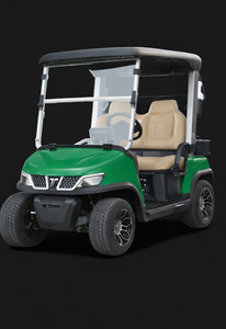 Green Tara Spirit Pro electric golf cart with luxury seating, foldable windshield, turf-friendly tires, and professional golf course design.