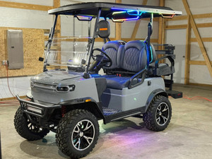 TEKO EV Turbo 4 passenger lithium electric golf cart with touchscreen display, LED underglow lighting and rear flip seat at East Central Sports Rush City Minnesota
