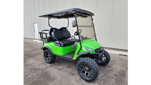 The 2024 MadJax X Series X4 Golf Cart features a sleek, modern design with a bold front grille, LED lighting, and vibrant high-gloss color options. The luxurious interior includes premium seating, USB ports, cup holders, and a folding windshield. With a 3" lift, hydraulic disc brakes, and a powerful 5KW motor, this cart is built for style and performance.