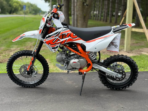 "The 2025 Kayo TT125 EFI pit bike features aggressive styling with its fuel-injected 123cc engine, hydraulic disc brakes, and competition suspension. Shown with knobby tires, high-mounted exhaust, and digital instrumentation, this bike combines race-ready performance with trail-friendly versatility