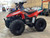 The image showcases the Kayo Storm 70, a compact and stylish youth ATV designed for riders aged 6 and above. The ATV features a sleek white body with bold branding, highlighting its modern design. The image captures the ATV’s sturdy frame, robust tires, and ergonomic seat, emphasizing its suitability for young riders. The front and rear hydraulic disc brakes, as well as the non-adjustable suspension system, are visible, showcasing the ATV’s focus on safety and performance. The electric ignition system and air-cooled engine are also highlighted, making it clear that this ATV is built for ease of use and reliability. The image is set against a natural backdrop, suggesting the ATV’s capability to handle off-road adventures.