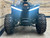 The image features the Denago E-Hawk 6 ATV, a sleek and modern electric ATV designed for kids aged 6 and up. The ATV showcases a bold black finish with multicolored LED lights, giving it a stylish and futuristic look. The rugged all-terrain tires (AT 16 x 8-7) and double A-arm front suspension highlight its capability to handle various terrains, from dirt trails to grassy fields. The handlebar-mounted controls, including the push-button gear selector and keyed ignition, are clearly visible, emphasizing the ATV's user-friendly design. The compact dimensions (51" x 31" x 32.5") and low seat height (23.5") make it perfectly sized for young riders, while the 48V removable lithium-ion battery and 1600W brushless electric motor underscore its eco-friendly and high-performance features. Safety elements like dual hydraulic disk brakes and an anti-theft alarm are subtly integrated into the design. This image captures the essence of the E-Hawk 6 ATV as a safe, fun, and technologically advanced electric vehicle for kids.
