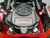 Toro 50" TimeCutter Max MyRide Zero Turn Mower (77502), highlighting its innovative MyRIDE® Suspension System with a close-up of the large spring coil. This feature isolates the operator from rough terrain, providing a smooth and comfortable ride while mowing. The mower’s heavy-duty steel IronForged® Deck is prominently displayed, emphasizing its durability and ability to handle tough mowing conditions. The beefy hybrid-tread rear tires are shown for maximum traction, ensuring the mower can navigate any terrain without damaging the turf. Additionally, the image highlights the spray-blocking fenders, which prevent debris and water from splashing onto the engine or operator. The automotive-style fuel fill and integrated drain hose are also visible, showcasing the mower’s user-friendly maintenance features. With its ultra-strong, fully tubular steel frame and 23 hp Kawasaki engine, this zero-turn mower is designed for professional-grade performance and residential comfort.