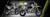 Thumpstar TSK 90cc mini bike, featuring its sleek mini stealth plastics, compact frame, and bold design. The bike is displayed in an action-ready stance, highlighting its inverted front suspension, oversized disc brakes, and Pipe Bomb muffler. The wrap-around frame and waterproof wiring are subtly visible, emphasizing the bike’s durability. The image also highlights the adjustable throttle limiter and emergency lanyard kill switch, key safety features for junior riders. Thumpstar TSK 90cc mini bike, featuring its sleek mini stealth plastics, compact frame, and bold design. The bike is displayed in an action-ready stance, highlighting its inverted front suspension, oversized disc brakes, and Pipe Bomb muffler. The wrap-around frame and waterproof wiring are subtly visible, emphasizing the bike’s durability. The image also highlights the adjustable throttle limiter and emergency lanyard kill switch, key safety features for junior riders.