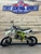 Side View: Lime Denago MX2 125cc dirt bike side view
Shifter: Denago MX2 CNC aluminum folding shifter