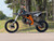 Orange Denago MX3 140cc dirt bike side view, Denago MX3 CNC aluminum folding shifter