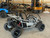 The image showcases the Hammerhead by Polaris MudHead 208R, a versatile and high-performing go-kart designed for young adventurers aged 10 and up. The go-kart features a sleek and durable design with a brush guard at the front for added protection. The 208cc LCT electric-start engine is highlighted, emphasizing the go-kart's power and ease of use. The dual LED headlights and canopy top are visible, showcasing the go-kart's stylish and functional design. The 16 x 6 – 8-inch front tires and 16 x 7 – 8-inch rear tires provide excellent traction and stability, while the rear hydraulic disc brake ensures safe and reliable stopping power. The three-point harness seatbelt adds an extra layer of safety, making it a perfect choice for young riders. Overall, the image captures the essence of a safe, durable, and fun go-kart ready for endless adventures.