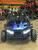 The image showcases the Hammerhead by Polaris MudHead SE, a sleek and stylish go-kart designed for young adventurers aged 10 and up. The go-kart features a modern design with upgraded plastic body panels and a steel bumper, emphasizing its durability and style. The 208cc LCT electric-start engine is highlighted, showcasing the go-kart's power and ease of use. The dual LED headlights and canopy top are visible, adding to the go-kart's functional and stylish design. The ROPS roll cage and three-point safety belts are prominently displayed, underscoring the go-kart's commitment to safety. The 16-inch tires and rear hydraulic disc brake ensure excellent traction and reliable stopping power. Overall, the image captures the essence of a safe, durable, and fun go-kart ready for endless adventures.