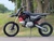 Main: 2026 IBX Whip PAD125-3 125cc Red manual pit bike
Side View: Red IBX Whip 125cc manual pit bike side view
Engine: IBX Whip PAD125-3 125cc air-cooled four-stroke engine
Transmission: IBX Whip 4-speed manual clutch transmission
Clutch: IBX Whip hand operated manual clutch
Kick Start: IBX Whip PAD125-3 kick start system
Frame: IBX Whip twin tube cradle frame