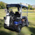 Green Tara Spirit Pro electric golf cart with luxury seating, foldable windshield, turf-friendly tires, and professional golf course design.